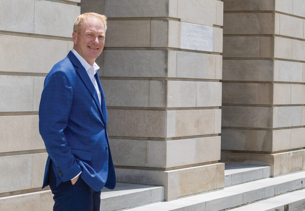 Banker in front of bank