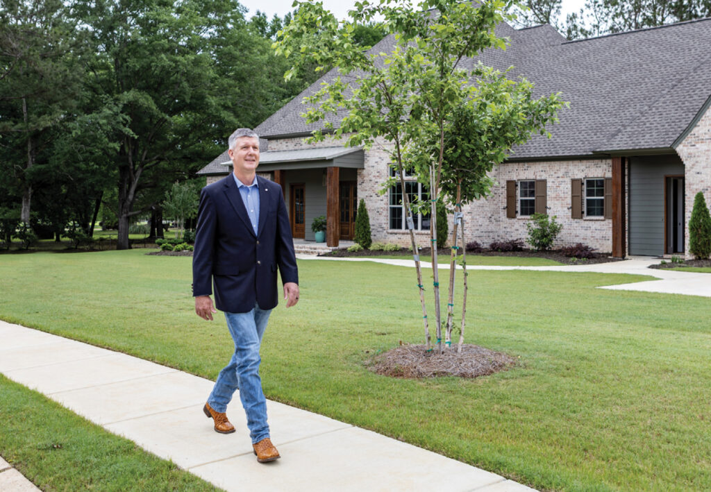 Personal Mortgage in front of house